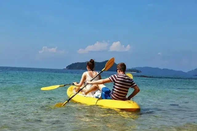 Kayaking in the turquoise waters of Koh Mak
